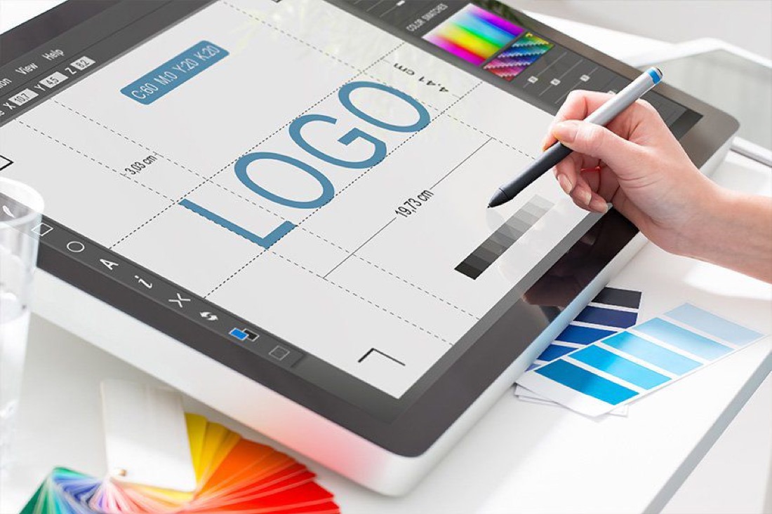 Designer creating a logo on a graphics tablet